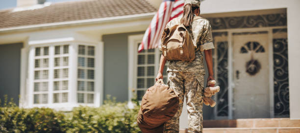 istock Back view of a military mom returning from the army 1430628768