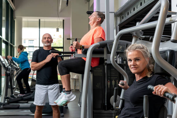 istock Middle-aged friends in the gym. 1430631727