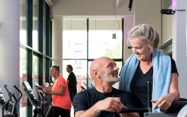 istock Middle-aged couple in the gym. 1430631941
