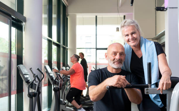 istock Middle-aged couple in the gym. 1430632013