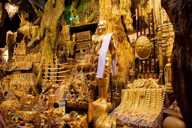 Tunnel naka cave underground and treasure for thai people travel visit respect praying blessing holy worship mystical naga statue at Wat Maniwong temple on September 6, 2022 in Nakhon Nayok, Thailand