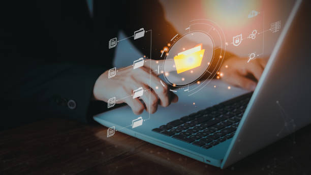 istock Businessman hand search for information on notebook (Laptop) with hologram. Planning and strategy concept. Success business concept. Data management system statistics and analytics. KPI report. 1430646303