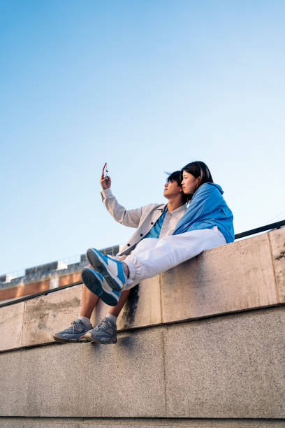 istock Happy Couple Taking Selfie 1430646528