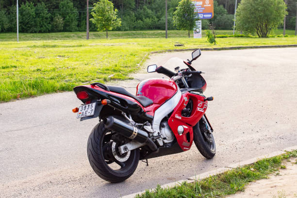 Belarus, Novopolotsk - 09 june, 2021: Red motorcycle yamaha on the road close up