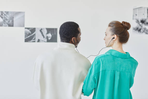 istock Young Couple Looking at Art in Museum 1430662545