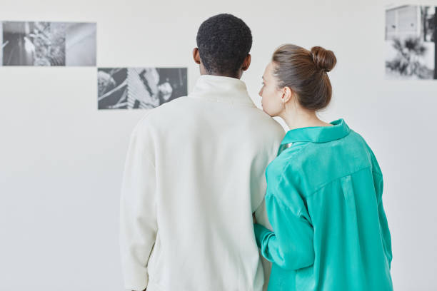 istock Couple Looking at Art in Museum Back View 1430662552
