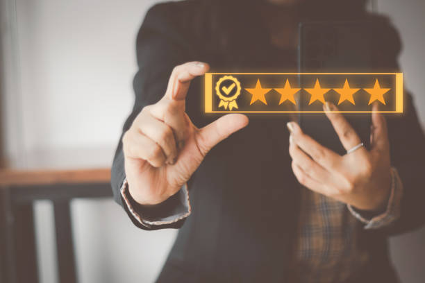 istock Customer service and Satisfaction concept Men's hands doing online assessments in the satisfaction rating the popular service company allows customers in order to improve and develop the organization 1430664300