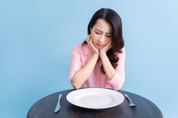 istock Young Asian woman eating, eat concept 1430670102