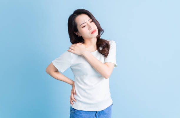 istock Young Asian woman has neck pain 1430670176