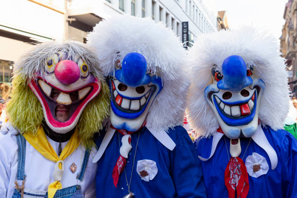 Basel carnival 2022 waggis portrait Switzerland, Basel, 8 March 2022.  Close-up of three carnival participants wearing waggis masks fastnacht stock pictures, royalty-free photos & images