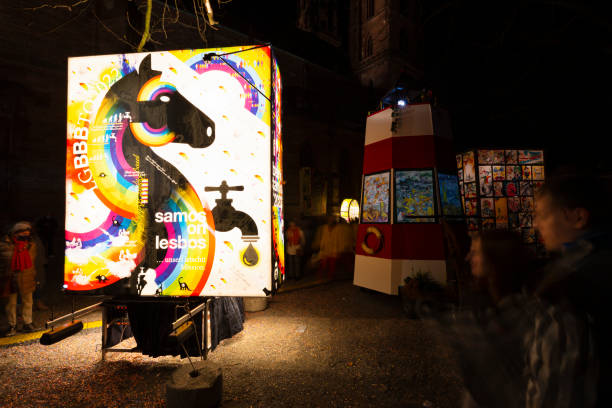 Switzerland, Basel, 8 March 2022. A hand painted colorful illuminated carnival lantern displayed on the cathedral square