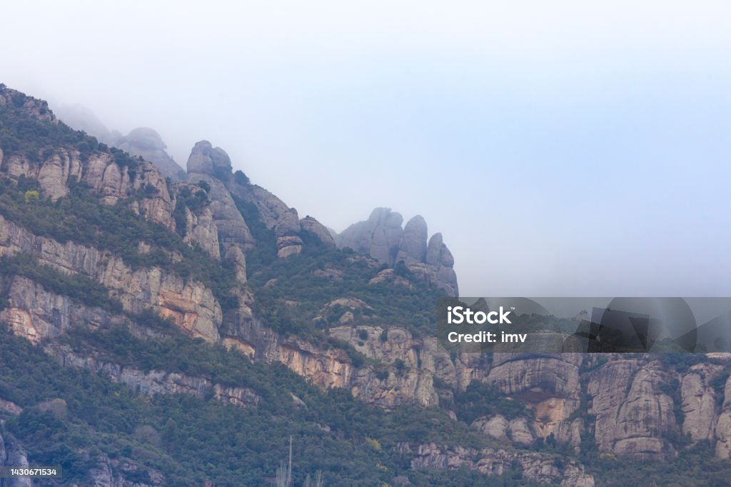 Montserrat mountain foggy morning, Collbató Montserrat mountain morning with fog Autumn Stock Photo
