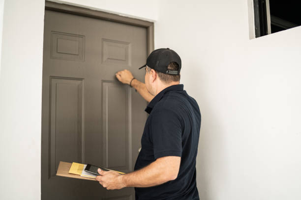 istock Mid adult man delivering package at shipment address 1430673921