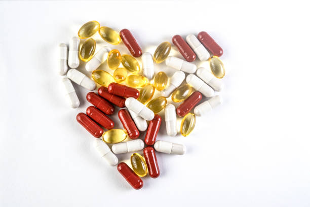 istock supplements, pills arranged to look like a heart 1430685697