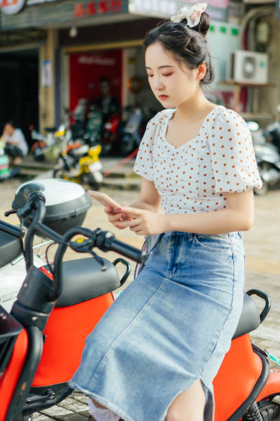 istock A woman rides an electric scooter 1430695129