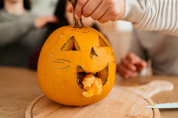 istock Carving Up A Pumpkin For Halloween 1430697627