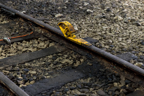 istock Train stopper or Train bumper installed on track for break. Train stopper for stop train running while parking at railway station at terminus or endways of Railway. 1430700695