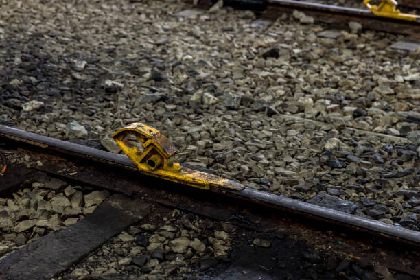 istock Train stopper or Train bumper installed on track for break. Train stopper for stop train running while parking at railway station at terminus or endways of Railway. 1430700696