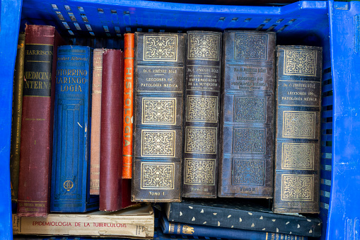 Old spanish medical books for sale at El Rastro flea market in Madrid, Spain