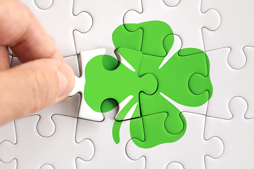 Complete lucky shamrock in the puzzle, missing part to be happy