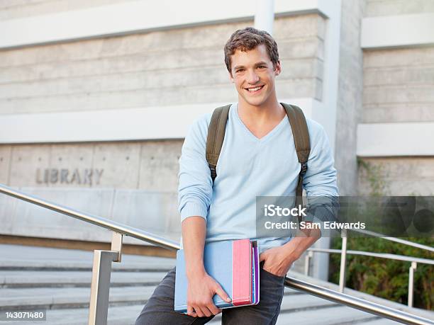 Student Standing On Steps Outdoors Stock Photo - Download Image Now - University Student, Student, Men