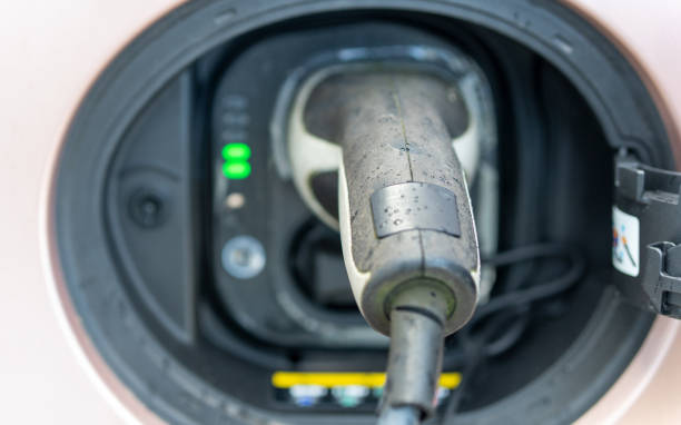 istock Charging cable is plugged into the electric car 1430719955