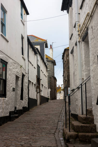 istock The Digey, a old cobbled lane in Downalong, St. Ives, Cornwall, UK 1430723867