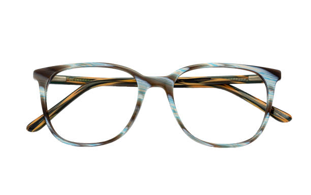 istock Eyeglass frames, lenses, various colors, both metal and plastic, on a beautiful colored background. 1430727579