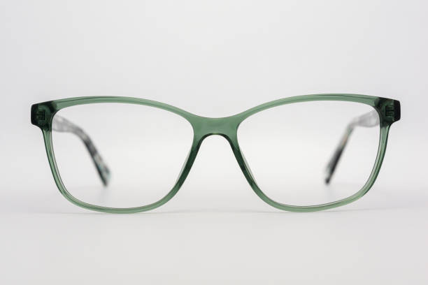 istock Eyeglass frames, lenses, various colors, both metal and plastic, on a beautiful colored background. 1430727733