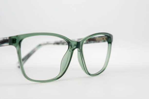 istock Eyeglass frames, lenses, various colors, both metal and plastic, on a beautiful colored background. 1430727767