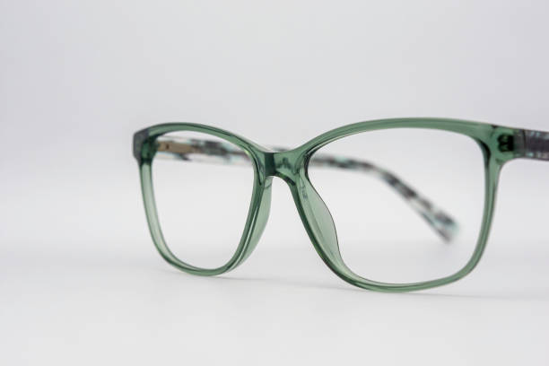 istock Eyeglass frames, lenses, various colors, both metal and plastic, on a beautiful colored background. 1430727776