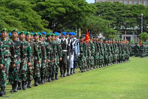 Soldiers walk following a ceremony marking the 77th anniversary of the Indonesian Armed Forces in Banda Aceh on Wednesday, October 5, 2022.