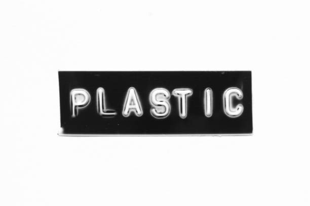 Black color banner that have embossed letter with word plastic on white paper background