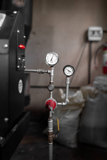 Close up of a coffee roaster machine pressure meter. Concept of local coffee production
