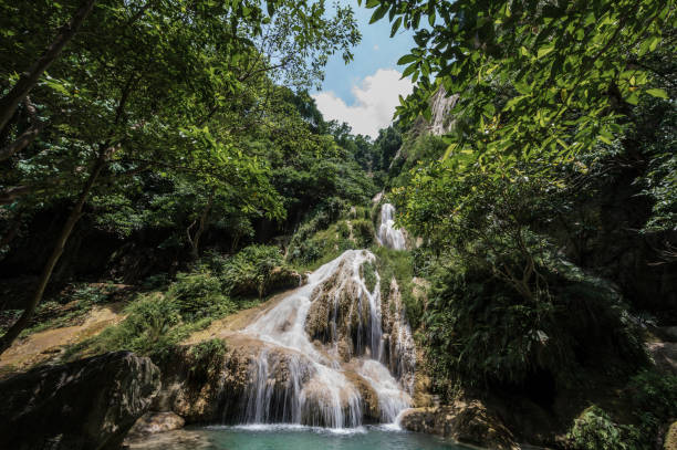 landscape view of erawan waterfall kanchanaburi thailand. - travel travel locations nature erawan imagens e fotografias de stock