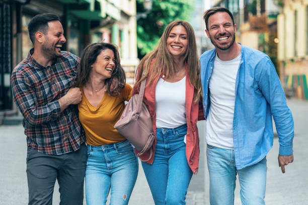 istock Friends having fun outdoors in the city 1430737422