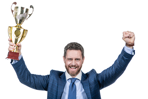 business success. successful man boss got prize. best entrepreneur of year. trophy and prestige. happy director ceo celebrate victory award. achievement. mature businessman in suit hold golden cup.