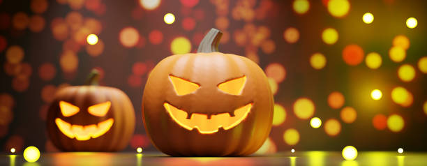 istock Halloween pumpkin scary eyes glowing in bokeh lights background. 1430740241