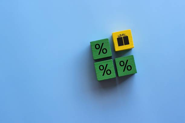 istock Wooden cubes with gift icon and percentage. 1430742716