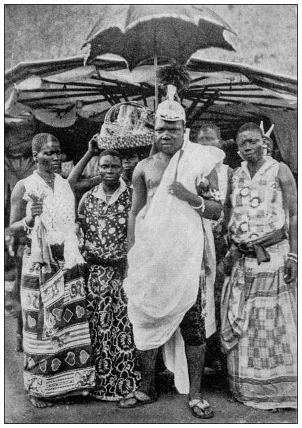 Antique image: Ago Li Agbo, King of Abomey, Benin and his wives Antique image: Ago Li Agbo, King of Abomey, Benin and his wives polygamy stock illustrations
