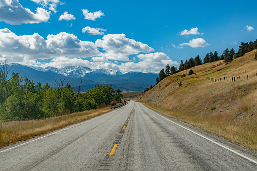 Montana highway toward Bear tooth mountains and Nye, Montana in western USA.