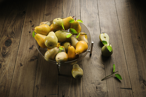 Digitally generated glass bowl full of ripe pears on a wooden background.

The scene was created in Autodesk® 3ds Max 2023 with V-Ray 6 and rendered with photorealistic shaders and lighting in Chaos® Vantage with some post-production added.