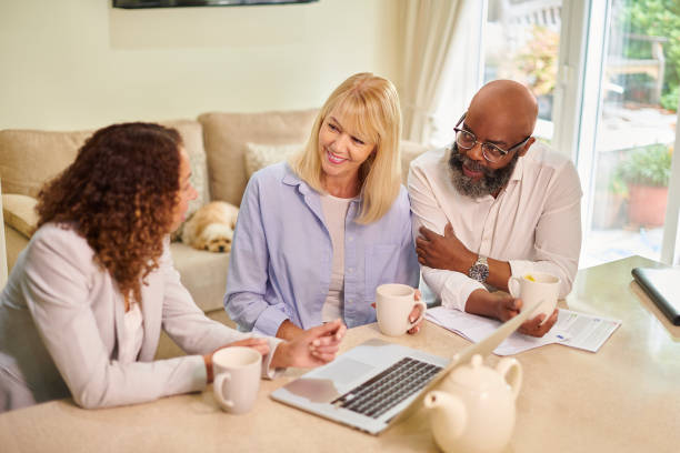 istock financial advisor with senior couple 1430747661