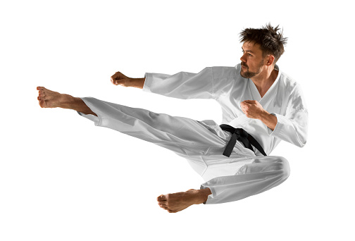 Martial arts masters, karate practice. Isolated background
