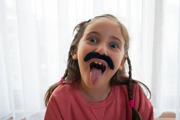 istock Mustached Little Girl 1430751077
