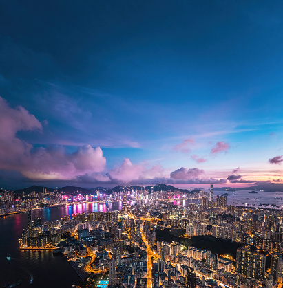 Futuristic cityscape, cyberpunk tone of metropolis, Kowloon, Hong Kong, Night aerial view, Asia