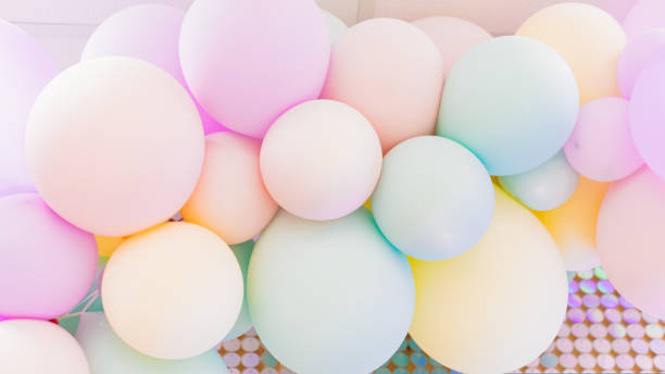 istock pink, beige and light green balloons. 1430754733