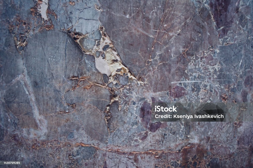 Rock holography. Holographic neon colors. Texture marble pattern. Abstract background. Lava. Rock texture. Stone background. Rock background. Rough structure. Wallpaper abstraction. Cracks wall Purple Stock Photo