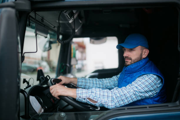 istock Truck driver driving his truck 1430761320