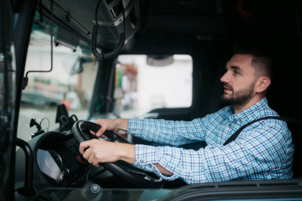 istock Truck driver driving his truck 1430761323